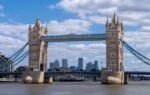 Iconic Tower Bridge over the River Thames in London on a clear day with blue skies.