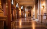 Capture of the luxurious interior of the Burgtheater in Vienna, showcasing architectural elegance and opulence.