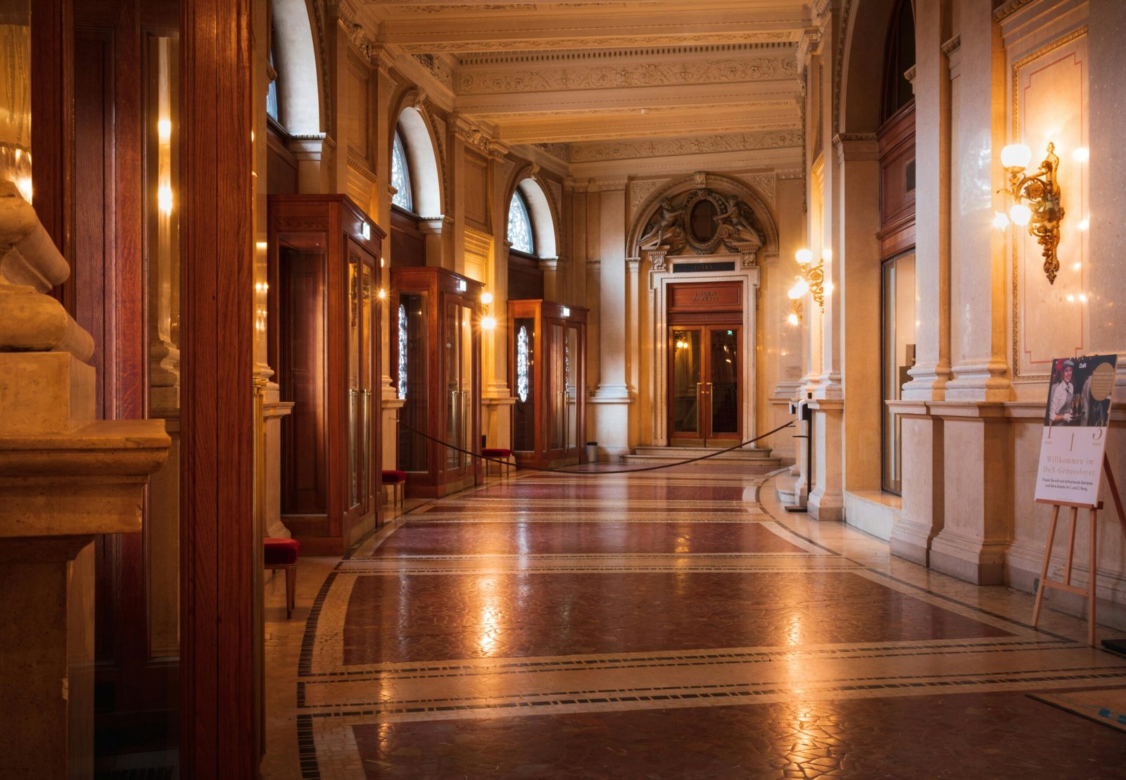 Capture of the luxurious interior of the Burgtheater in Vienna, showcasing architectural elegance and opulence.
