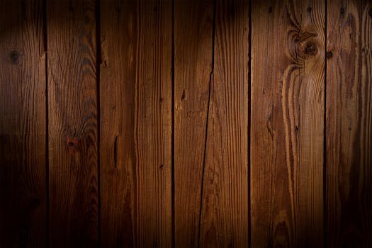 High-quality rustic wooden plank background showcasing natural wood grain texture, ideal for design and decor projects.