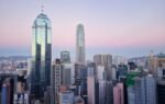 A stunning view of Hong Kong's skyscrapers and urban skyline at twilight.