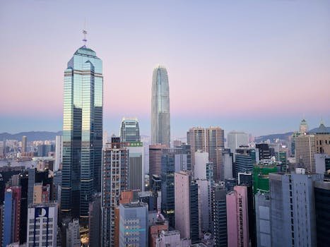 A stunning view of Hong Kong's skyscrapers and urban skyline at twilight.