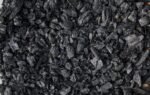 High-resolution image showing a detailed view of charcoal pieces, ideal for fuel or artistic use.