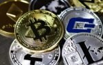 Close-up view of assorted cryptocurrency coins featuring Bitcoin, Litecoin, and others, symbolizing digital finance.