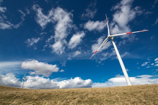 Wind turbines under a vibrant blue sky, showcasing renewable energy in Ordu, Turkey.